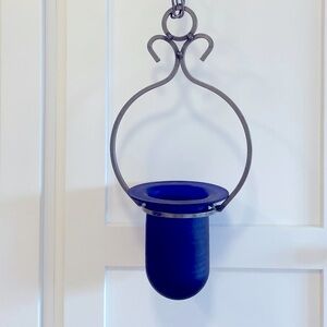 Artisan cobalt blue vase with handmade ironwork